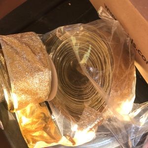 Gold glitter ribbon not sure what the yardest is